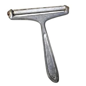 Vintage metal wire cheese slicer, possibly made by Presto.